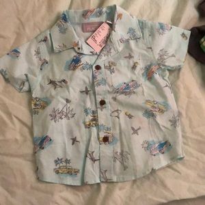 Infant children place shirt